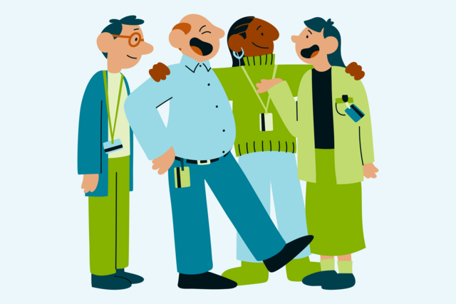 To menn med blå genser og to kvinner med grønn genser ler sammen